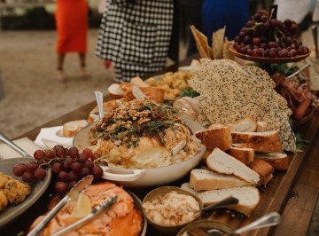 Grazing Table:<br />
Ciabatta, focaccia, chargrilled chorizo, salami, hot smoked salmon, marinated olives, Whitestone blue, Lindis Pass brie, Mozzarella & semi-fried tomato arancini, beetroot and orange chutney, caramelised onion & ale relish, preserved lemon labne, grapes, and pickled figs.