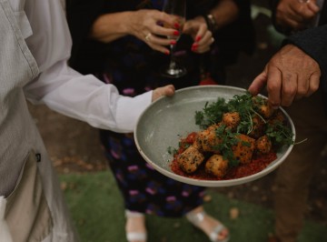 Grilled black & white sesame halloumi bites with burnt chilli jam.