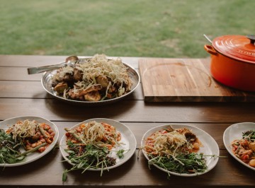 Chicken station:<br />
Wood roasted heritage chickens with leek and garlic mustard<br />
Coal simmered heirloom beans and spring vegetable ragout<br />
Bacon, pea and wild rice salad<br />
