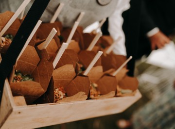 Noodle box with Thai beef salad with tomato, cucumber and chilli topped with coriander and peanuts <br />
