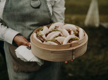 Fried chicken bao buns, with pickled carrot, coriander and gojuchang mayo