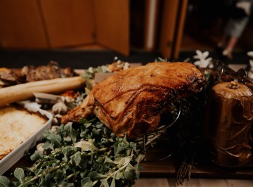 Hot ham on the bone, bourbon brown sugar glaze with sour cherry chutney