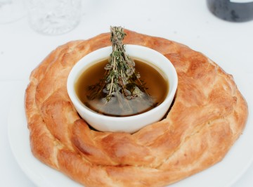 Plaited honey saffron bread with thyme olive oil.